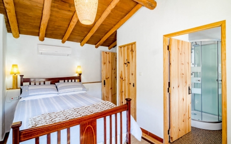 This bedroom is AC equipped